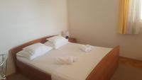 Postel nebo postele na pokoji v ubytování Apartments Villa Anna