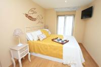A bed or beds in a room at vivienda vieja cepa