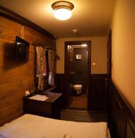 Łóżko lub łóżka w pokoju w obiekcie Boat Hotel Matylda