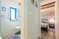 Łóżko lub łóżka w pokoju w obiekcie Holiday House Kate