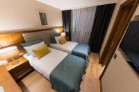 A bed or beds in a room at Endless Art Hotel-Special Category