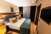 A bed or beds in a room at Endless Art Hotel-Special Category