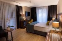 A bed or beds in a room at Endless Art Hotel-Special Category