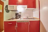 Kuchyň nebo kuchyňský kout v ubytování Appartements Alpin