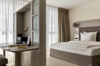 The Mandala Berlin, a Member of Design Hotelsにあるベッド