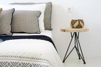 A bed or beds in a room at Le Blanc Suite
