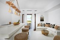 A seating area at Le Blanc Suite