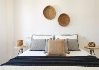 A bed or beds in a room at Le Blanc Suite