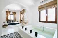 A bathroom at Le Blanc Suite