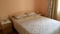 Posteľ alebo postele v izbe v ubytovaní Apartman Viktorija
