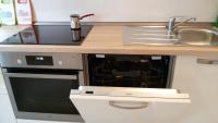 Kuchyňa alebo kuchynka v ubytovaní Apartman Viktorija