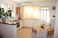 Kuchyň nebo kuchyňský kout v ubytování Apartment Anand