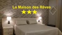 Posteľ alebo postele v izbe v ubytovaní La Maison Des Rêves