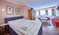 Postel nebo postele na pokoji v ubytování Appartements Alpin