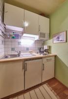 Kuchyň nebo kuchyňský kout v ubytování Appartements Alpin