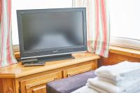 TV a/nebo společenská místnost v ubytování Appartements Alpin