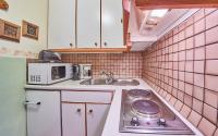 Kuchyň nebo kuchyňský kout v ubytování Appartements Alpin
