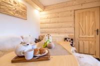 Posteľ alebo postele v izbe v ubytovaní Apartamenty Kiry Zakopane