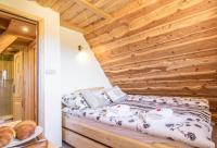 Posteľ alebo postele v izbe v ubytovaní Apartamenty Kiry Zakopane