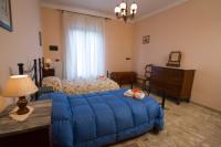 Posteľ alebo postele v izbe v ubytovaní Casa Elena