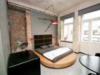 Łóżko lub łóżka w pokoju w obiekcie Loft Sen Pszczoły