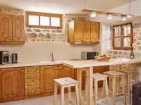 Kuchyňa alebo kuchynka v ubytovaní Helios Garden Boutique Apartments