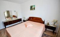 Łóżko lub łóżka w pokoju w obiekcie Jurica Apartments