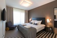 Postel nebo postele na pokoji v ubytování Hedon Spa & Hotel