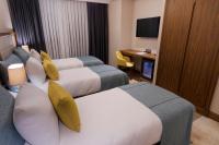 A television and/or entertainment centre at Endless Art Hotel-Special Category