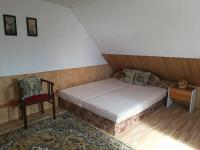Postel nebo postele na pokoji v ubytování Apartman v zahrade