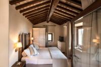 Postel nebo postele na pokoji v ubytování Agriturismo Galenzana