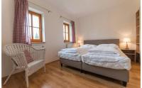 Postel nebo postele na pokoji v ubytování Apartmány Nová Pec