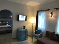 A bed or beds in a room at Hotel Atrium
