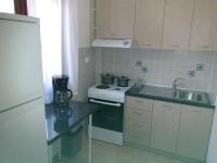 Kuchyňa alebo kuchynka v ubytovaní Platanos Apartment