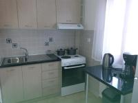 Kuchyňa alebo kuchynka v ubytovaní Platanos Apartment