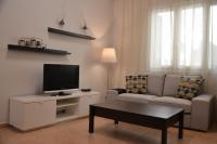 Televízia a/alebo spoločenská miestnosť v ubytovaní Casa Afrodite