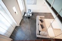 Posedenie v ubytovaní Stylish Loft with BALCONY