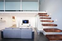Televízia a/alebo spoločenská miestnosť v ubytovaní Stylish Loft with BALCONY