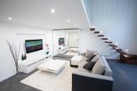 Televízia a/alebo spoločenská miestnosť v ubytovaní Stylish Loft with BALCONY