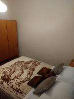 Łóżko lub łóżka w pokoju w obiekcie Marie