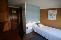 A bed or beds in a room at PR La Paz