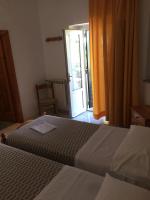 Postel nebo postele na pokoji v ubytování Albergo Villa Mario