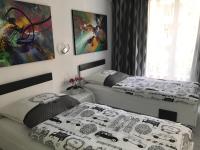 A bed or beds in a room at Laura City Egnatia