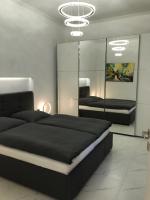 A bed or beds in a room at Laura City Egnatia
