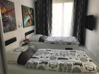 A bed or beds in a room at Laura City Egnatia