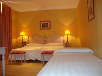 Posteľ alebo postele v izbe v ubytovaní Hotel San Camilo