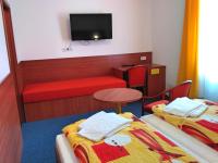Postel nebo postele na pokoji v ubytování Hotel Morava