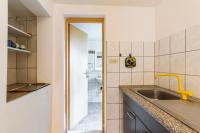 Kuchnia lub aneks kuchenny w obiekcie Apartments Gloria