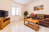 Telewizja i/lub zestaw kina domowego w obiekcie Apartments Gloria