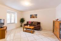 Telewizja i/lub zestaw kina domowego w obiekcie Apartments Gloria